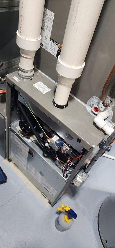 Completed scheduled heating maintenance on residential furnace system per Worry Free Service Agreement. Performed comprehensive inspection of gas furnace unit with access panel removed, checking all internal components including gas valve, control module, circuit boards, electrical connections, and safety devices. Verified proper operation of intake and exhaust PVC venting system, inspected all fittings and connections for secure installation. All components found to be in proper working order with no issues identified.