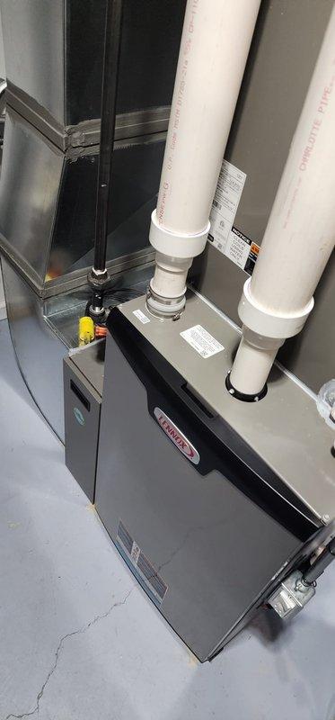 Completed scheduled heating maintenance on residential furnace system per Worry Free Service Agreement. Performed comprehensive inspection of gas furnace unit with access panel removed, checking all internal components including gas valve, control module, circuit boards, electrical connections, and safety devices. Verified proper operation of intake and exhaust PVC venting system, inspected all fittings and connections for secure installation. All components found to be in proper working order with no issues identified.