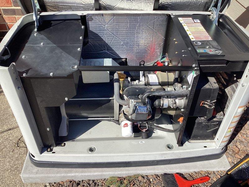 Completed scheduled maintenance on 8kW Generac residential standby generator. Performed comprehensive inspection of unit including removal and examination of spark plug, which showed normal wear patterns consistent with regular operation. Inspected internal compartment components including compressor, air filtration screen, copper refrigerant lines, and electrical connections. All mechanical components found to be in satisfactory operating condition with no immediate repairs required. Verified proper installation of access panels and secure mounting of all fasteners upon completion. Customer enrolled in ongoing maintenance plan for continued service coverage.