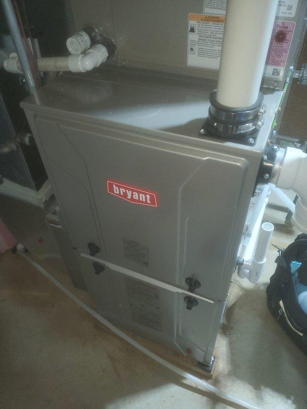 Completed scheduled preventative maintenance on Bryant residential gas furnace system. Performed comprehensive inspection of all major components including blower motor assembly, gas valve, electrical connections, control board, and condensate drainage system. Verified proper operation of all safety controls and electrical terminations, confirmed unit functionality, and documented equipment condition with photographic records.