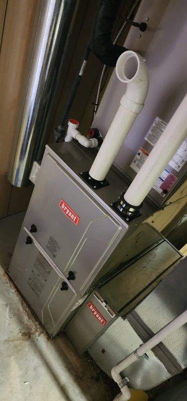 Completed comprehensive heating maintenance service on Bryant furnace system as part of preventative maintenance agreement. Performed thorough inspection of all mechanical and electrical components including blower motor assembly, wiring connections, gas valve, ignition system, and heat exchanger. Verified proper operation of exhaust and intake PVC venting system, checked condensate drain lines and traps for proper drainage, and confirmed all safety controls and limit switches functioning within manufacturer specifications. System tested and found operating efficiently with no issues identified.
