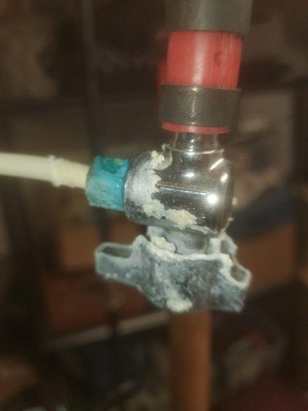 Performed annual maintenance and tune-up on 6-year-old furnace system located in basement. Completed comprehensive inspection of all mechanical and electrical components including blower motor assembly, gas valve, pressure switches, and control modules. Observed significant mineral buildup and white crystalline deposits on condensate drain line components and PVC piping, indicating potential drainage concerns that will require monitoring. All safety controls tested and verified operational, wiring connections inspected and confirmed secure, and unit returned to normal service.