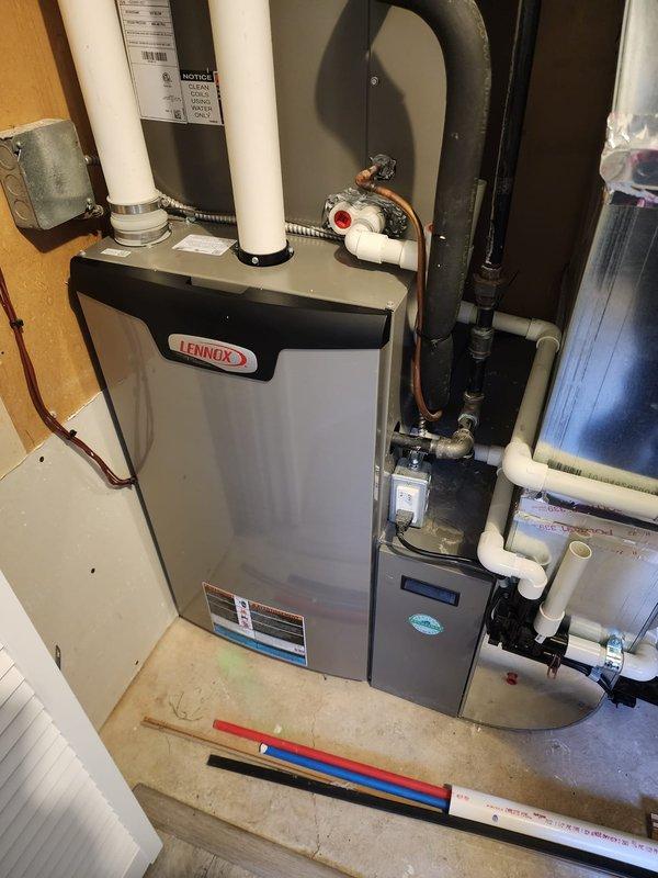 Completed comprehensive cooling system maintenance inspection on Lennox HVAC system as part of Worry Free Service Agreement renewal evaluation. Inspected indoor furnace unit with all connections, venting, and refrigerant lines found in proper working order, and performed outdoor condenser unit assessment confirming clean coils, intact protective grille, and stable mounting on concrete pad. Both indoor and outdoor components operating within normal parameters with no immediate service needs identified at this time.