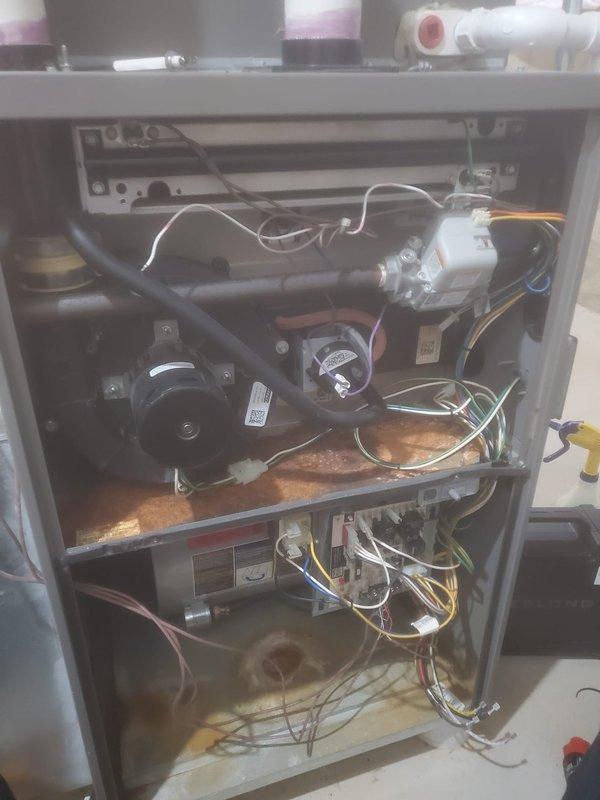 Completed comprehensive furnace maintenance inspection on Lennox forced-air heating system. Performed visual assessment of all internal components including blower assembly, heat exchanger, motor, electrical connections, and ventilation system; noted rust-colored oxidation present on heat exchanger surface requiring monitoring for potential future service needs. All major components remain operational with standard connections intact, and PVC venting system confirmed properly configured.