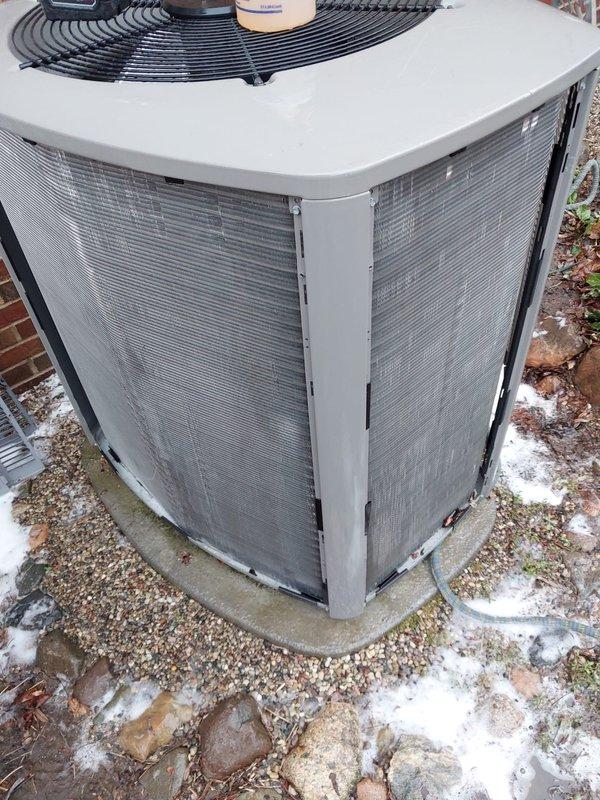 Completed scheduled maintenance on residential air conditioning system. Performed comprehensive inspection of outdoor condensing unit, including examination of compressor, condenser coil, refrigerant lines, and electrical connections. Condenser coil found to be clean with intact fins, compressor operating within normal parameters, and all copper refrigerant lines properly insulated and secure. Noted minor rust staining on drain pan but no active leaks or operational concerns. Unit confirmed to be in good working condition and ready for cooling season operation.