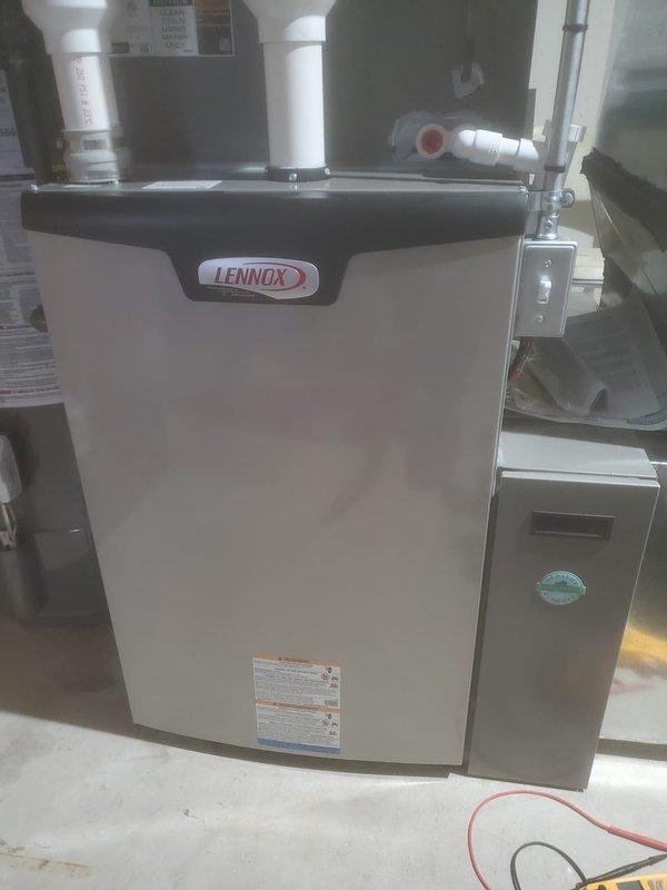 Completed routine preventive maintenance on 1.5-year-old Lennox furnace system located in basement as part of Worry Free Service Agreement. Performed comprehensive tune-up including inspection of blower motors, electrical connections, control boards, heat exchanger, and all wiring harnesses. All components operating within normal parameters with no issues identified.