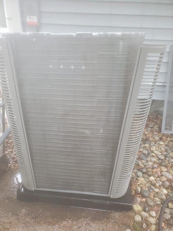 Completed scheduled air conditioning maintenance on residential outdoor condenser unit. Performed comprehensive system inspection including visual assessment of compressor assembly, refrigerant lines, and electrical connections. Inspected copper tubing and capillary lines for proper routing and condition. Verified electrical wiring connections and motor mounting hardware security. Exterior condenser coils showed normal dirt accumulation; unit operational and functioning within normal parameters. All components photographed and documented for service records.