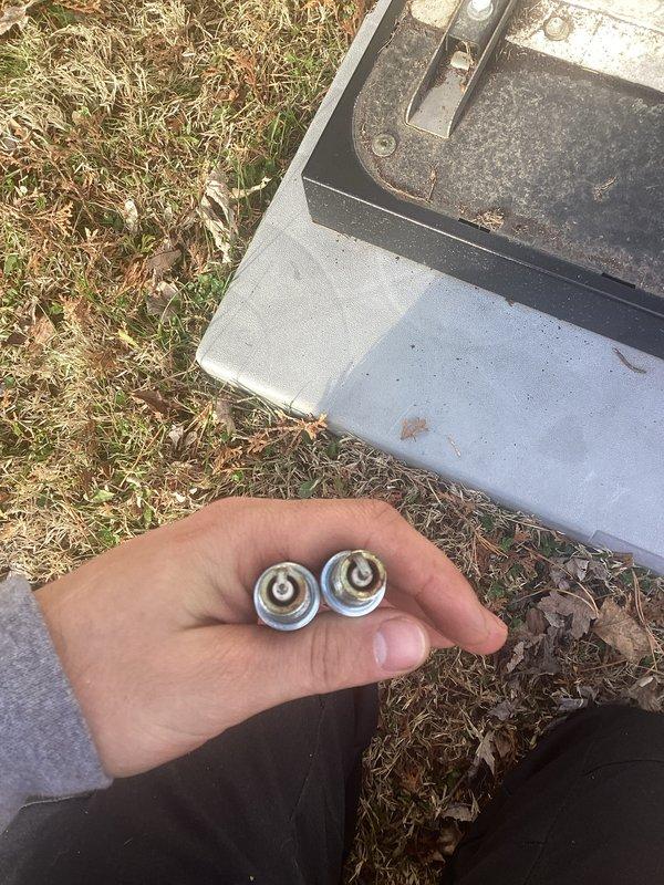 Performed scheduled maintenance on outdoor standby generator unit. Inspected and removed two run capacitors from the system for testing and evaluation. Both capacitors showed signs of wear consistent with normal operation in outdoor conditions. Cleaned accumulated dirt and debris from generator housing and internal components. Verified proper mounting and structural integrity of unit on concrete pad. Conducted visual inspection of electrical connections, mechanical linkages, and access panels. Replaced capacitors and restored unit to operational status. System tested and confirmed ready for automatic operation.