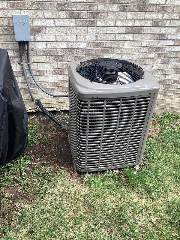 Completed comprehensive estimate for residential air conditioning system replacement. Evaluated existing outdoor condenser unit positioned against exterior brick wall, assessed electrical disconnect box and associated conduit connections, and documented current equipment configuration including pad placement and clearances. Provided customer with replacement options for upgraded HVAC system to improve cooling efficiency and reliability.