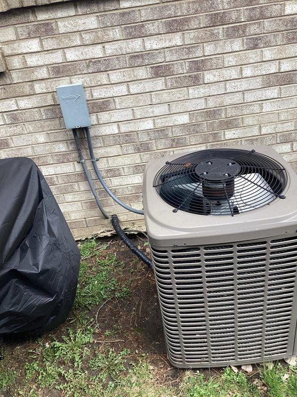 Completed comprehensive estimate for residential air conditioning system replacement. Evaluated existing outdoor condenser unit positioned against exterior brick wall, assessed electrical disconnect box and associated conduit connections, and documented current equipment configuration including pad placement and clearances. Provided customer with replacement options for upgraded HVAC system to improve cooling efficiency and reliability.