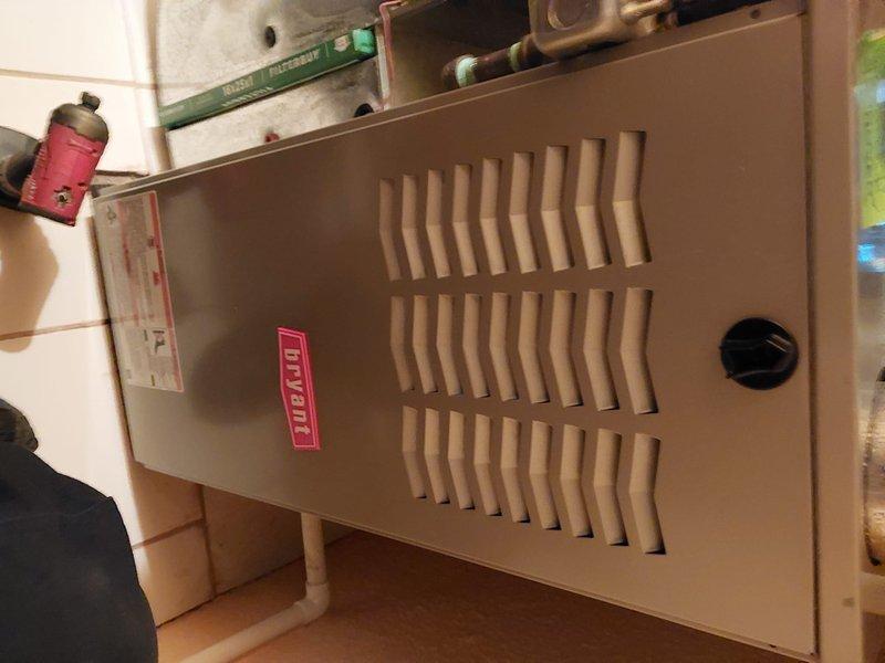 Completed scheduled maintenance on residential furnace and humidifier system. Performed comprehensive inspection of heating unit, verified all electrical connections and wiring integrity, examined blower motor assembly and control components. Inspected humidifier operation and water supply lines, checked copper tubing connections for proper seal. Cleaned and tested all safety controls, confirmed proper airflow through ventilation louvers, and documented system condition with photographs for service records.