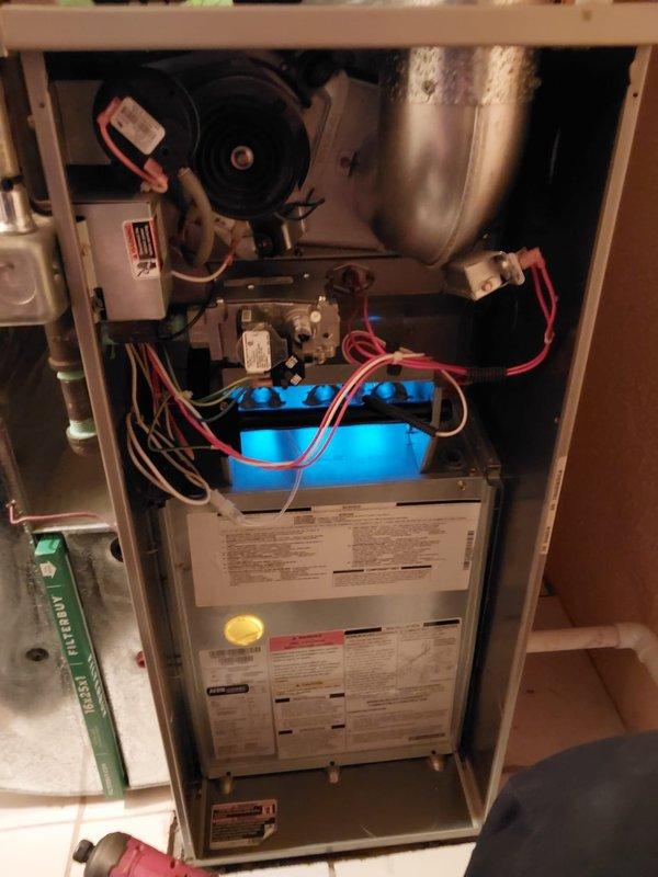 Completed scheduled maintenance on residential furnace and humidifier system. Performed comprehensive inspection of heating unit, verified all electrical connections and wiring integrity, examined blower motor assembly and control components. Inspected humidifier operation and water supply lines, checked copper tubing connections for proper seal. Cleaned and tested all safety controls, confirmed proper airflow through ventilation louvers, and documented system condition with photographs for service records.