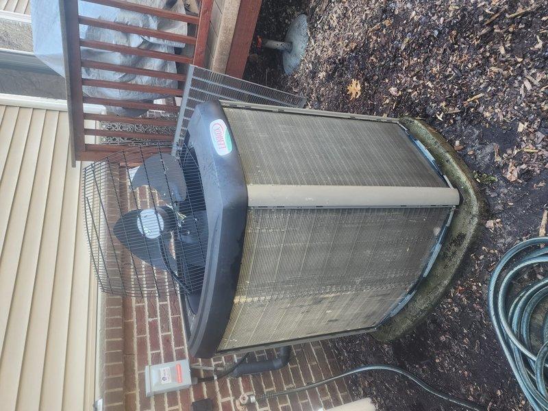 Completed annual preventative maintenance and tune-up on 7-year-old Lennox outdoor condensing unit located at rear of condominium. Performed comprehensive system inspection including cleaning condenser coils, checking refrigerant pressures, testing electrical components, verifying proper airflow through fan assembly, and inspecting refrigerant lines along exterior wall. Unit operating within normal parameters with no deficiencies noted; system ready for cooling season.