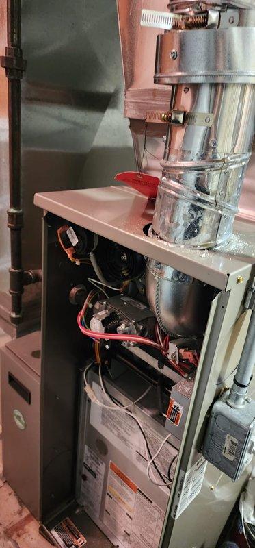 Completed comprehensive heating maintenance service on Bryant furnace system as part of Worry Free Service Agreement. Performed thorough inspection of all internal components including blower assembly, draft inducer motor, heat exchanger, refrigerant lines, and electrical connections. Verified proper operation of all safety controls and system functionality. Applied service completion stickers indicating successful maintenance completion and system compliance.