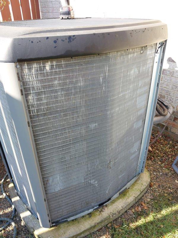 Completed scheduled cooling season maintenance on residential air conditioning system. Performed comprehensive inspection of outdoor condenser unit, including examination of coil fins, refrigerant lines, electrical connections, and overall component condition. Unit showed normal wear consistent with outdoor exposure, with weathering visible on cabinet panels and minor surface oxidation on copper refrigerant lines. Condenser coil fins displayed environmental debris accumulation, which was addressed during standard maintenance procedures. All system components were evaluated and found to be operating within normal parameters under the Worry Free Service Agreement coverage.
