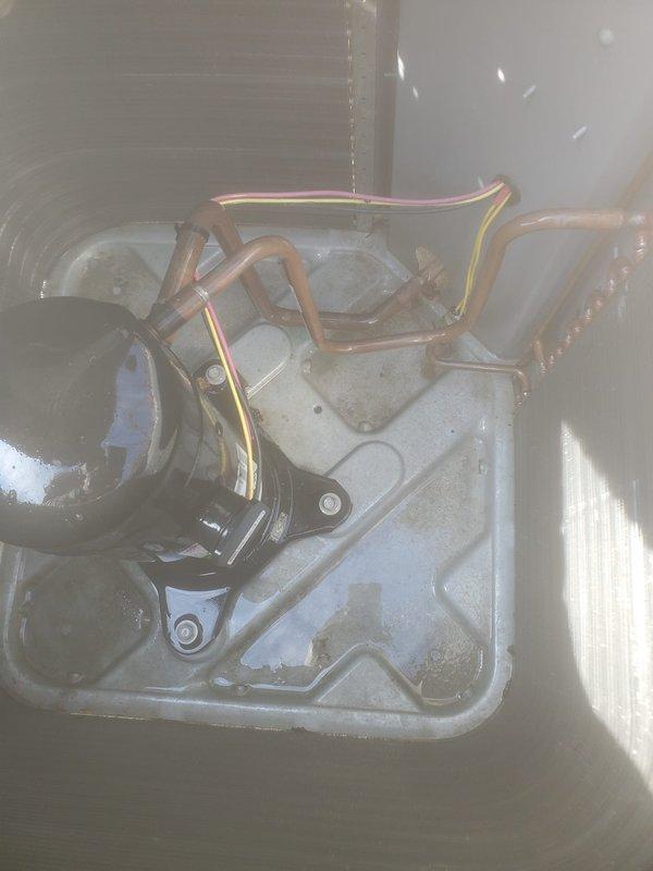 Completed scheduled maintenance on two residential air conditioning systems. Performed routine inspection of both outdoor condenser units, noting one heat exchanger showing corrosion on lower sections and fins. Documented equipment condition with photos, including compressor components and outdoor unit configurations. Both systems operational upon completion of preventive maintenance service.