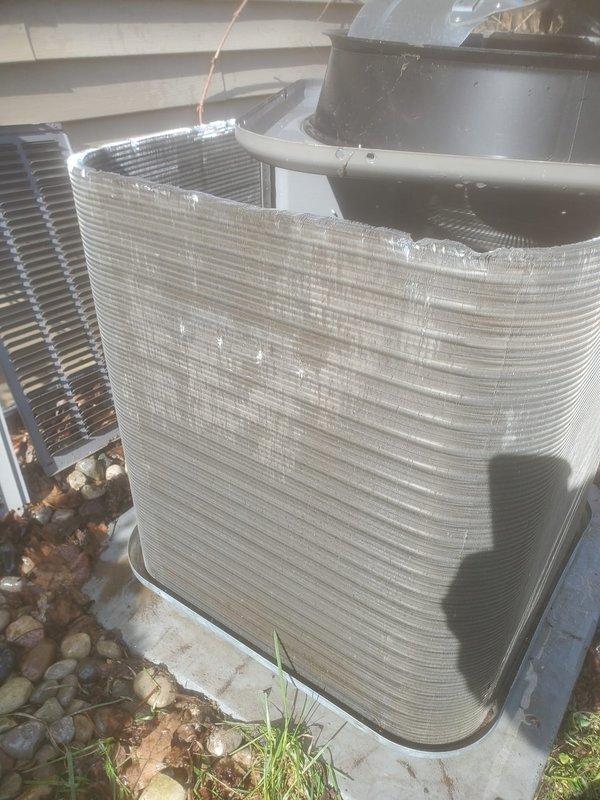 Completed scheduled maintenance on two residential air conditioning systems. Performed routine inspection of both outdoor condenser units, noting one heat exchanger showing corrosion on lower sections and fins. Documented equipment condition with photos, including compressor components and outdoor unit configurations. Both systems operational upon completion of preventive maintenance service.