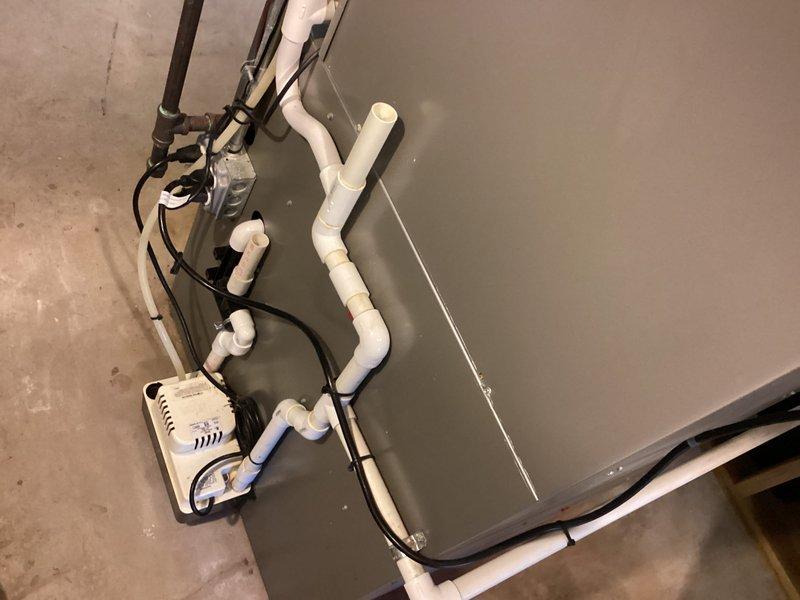Installed a 50-gallon tanked water heater with integrated water alarm system for leak detection. Mounted and configured an S40 thermostat for precise temperature control and installed an air scrubber unit to improve indoor air quality. All plumbing connections were completed to code, system was tested for proper operation, and equipment was commissioned successfully.