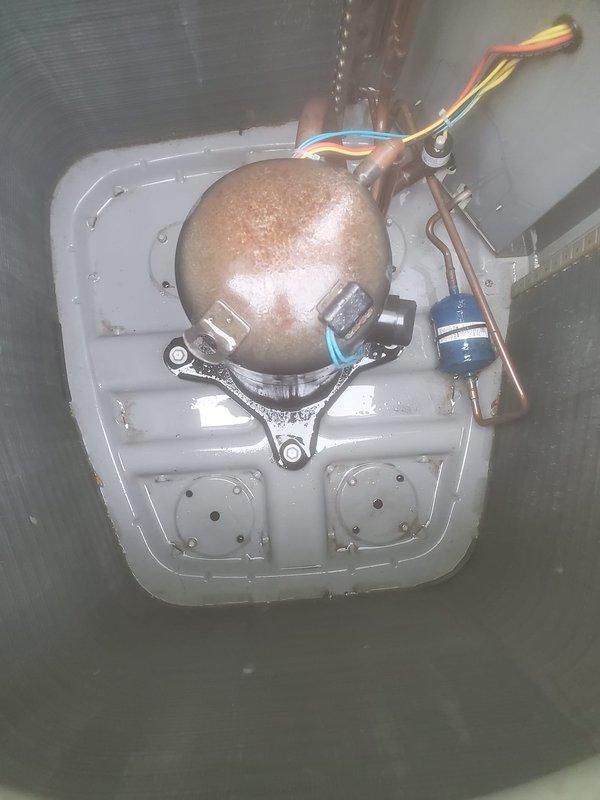 Completed comprehensive AC tune-up on 5-year-old outdoor condensing unit. Performed standard maintenance protocol including inspection of compressor, refrigerant lines, electrical connections, and condenser coil cleaning. Unit showing age-appropriate wear with minor dirt accumulation on coil fins and algae growth on pad; all components operating within normal parameters and system deemed ready for cooling season.