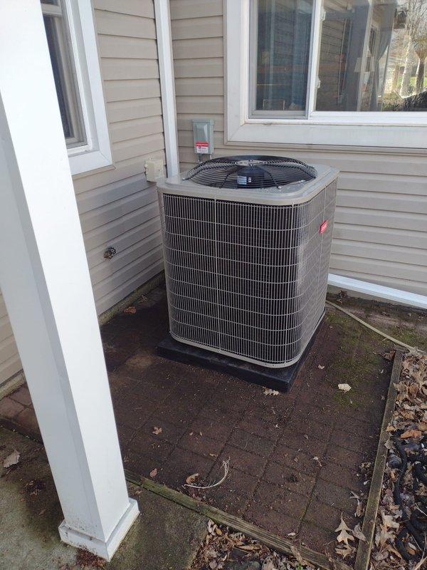 Completed full HVAC system installation including Bryant 80% efficiency gas furnace in interior utility closet and matching outdoor air conditioning condenser unit. Installed furnace with proper venting through flexible aluminum ductwork, connected gas and water lines, completed all electrical wiring and control connections, and mounted necessary safety components including electrical disconnect box. Positioned outdoor condenser on concrete pad against exterior wall with protective grille guard, verified refrigerant lines are properly connected between indoor and outdoor units, and confirmed all electrical connections are secure. System tested and operational upon completion.