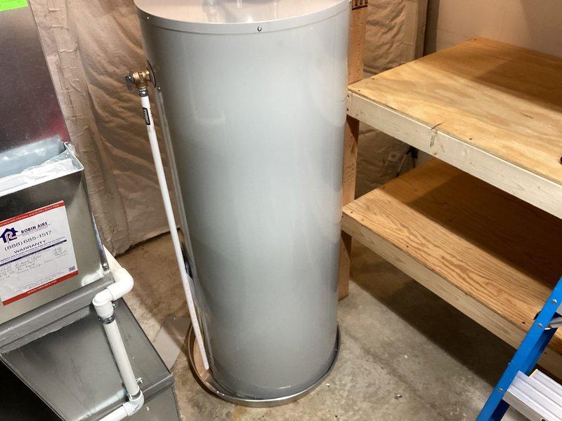 Successfully installed a new 50-gallon tanked water heater in the basement utility area. The installation included proper connection of water supply lines, discharge piping, and venting systems in accordance with local plumbing codes. All connections were tested and verified for proper operation upon completion.
