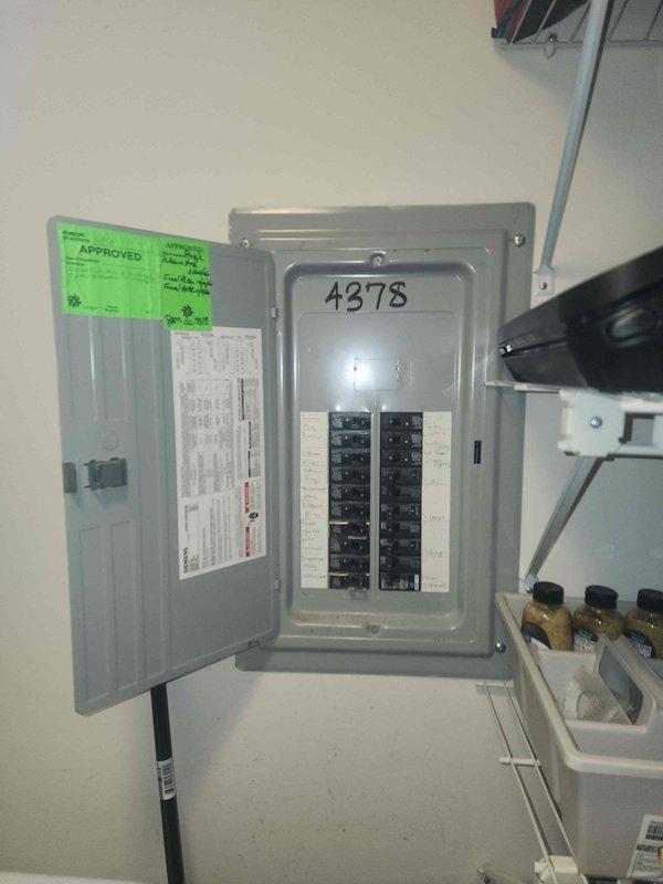 Conducted comprehensive site evaluation for electric vehicle charging station installation at residential property. Assessed existing electrical infrastructure by inspecting main circuit breaker panel, which contained dual columns of breakers with adequate access for potential modifications. Evaluated available electrical capacity and panel configuration to determine feasibility of adding dedicated 240-volt circuit required for Level 2 EV charger installation. Documented current electrical system specifications and panel layout to calculate load requirements and verify compatibility with proposed charging equipment. Assessed optimal routing path from electrical panel through interior spaces to planned charging location, noting wall construction and accessibility for future conduit installation. Provided customer with detailed installation estimate including electrical requirements, necessary materials, and scope of work to support their vehicle purchase decision.