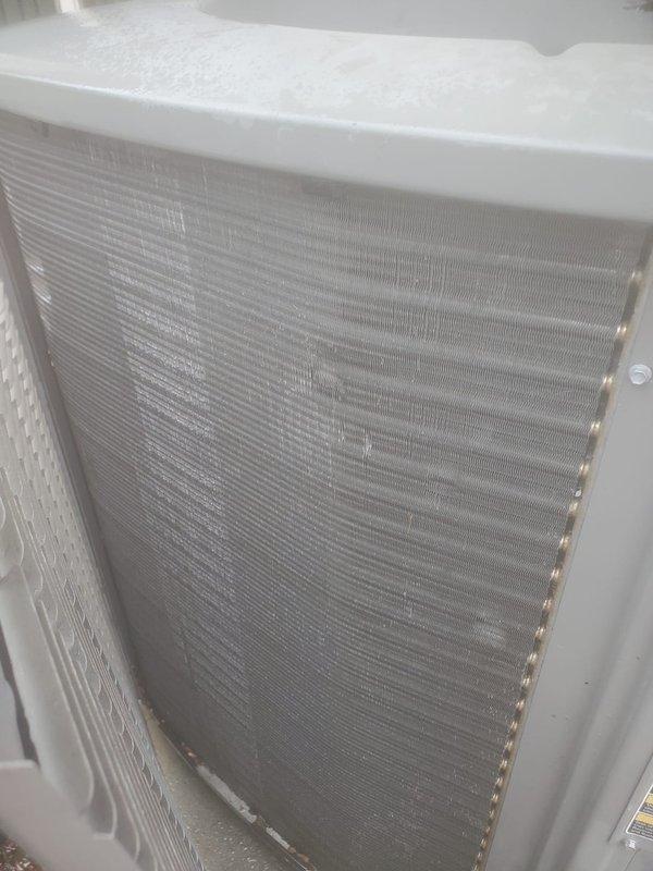 Completed comprehensive preventive maintenance on 12-year-old air conditioning system located at rear of property. Performed full AC tune-up including inspection of compressor assembly, refrigerant lines, and electrical connections; verified proper operation of condensing unit and examined condenser coil for airflow efficiency. All components inspected and found operating within normal parameters; unit showing typical wear for age with minor dust accumulation on coil fins, no immediate repairs required at this time.