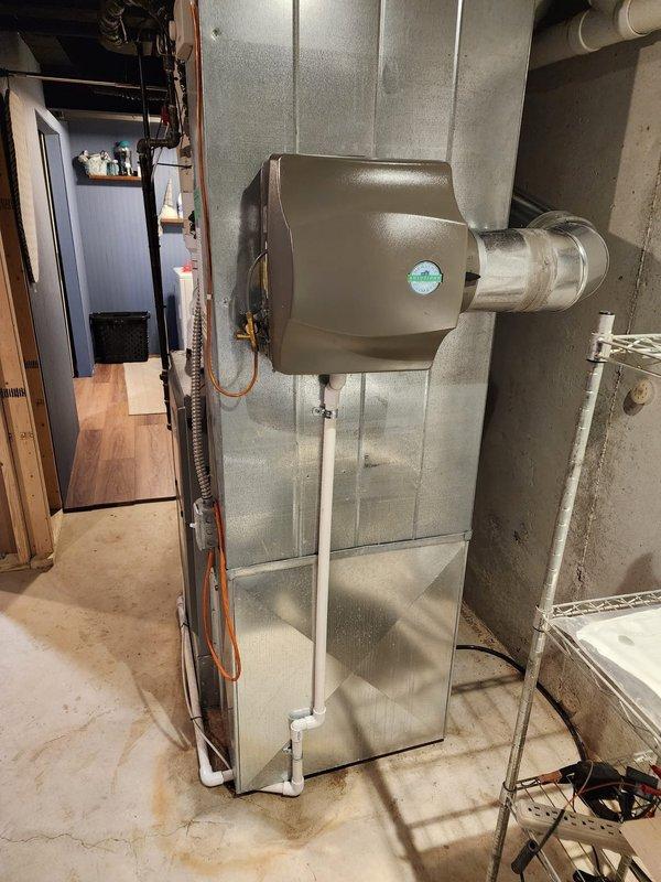 Successfully installed a new Lennox air conditioning system with the outdoor condensing unit relocated to the backyard as requested. The installation included proper refrigerant line connections, electrical wiring, and integration with the existing furnace and ductwork system to ensure optimal cooling performance and system efficiency.