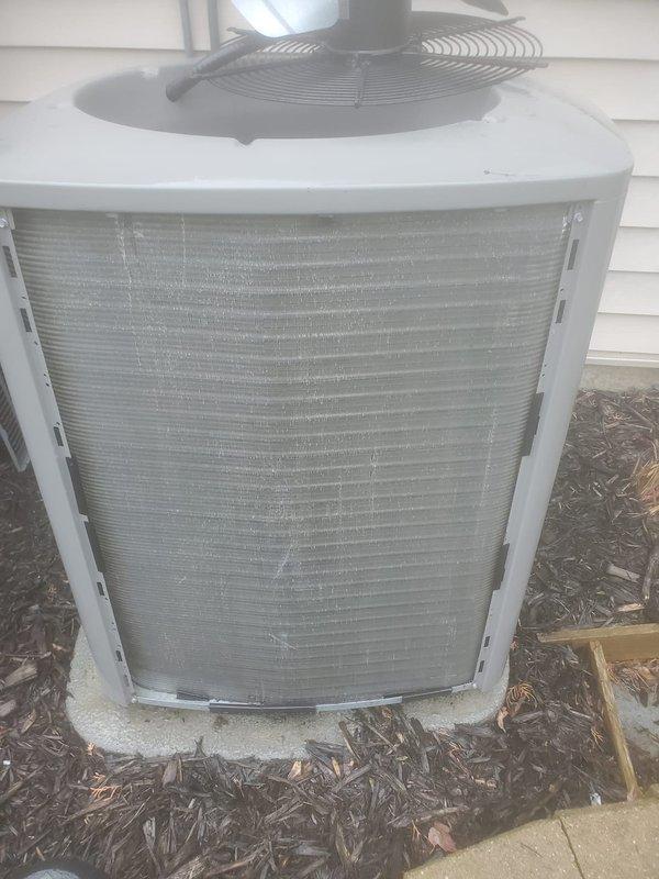 Completed scheduled air conditioning maintenance on residential split system. Inspected outdoor condenser unit, verifying proper operation of fan motor and compressor, checked refrigerant levels, and cleaned condenser coil fins. Evaluated indoor evaporator coil assembly and condensate drain system, confirmed condensate pump functioning correctly with proper drainage into collection pan. All components operating within normal parameters with no immediate service needs identified.