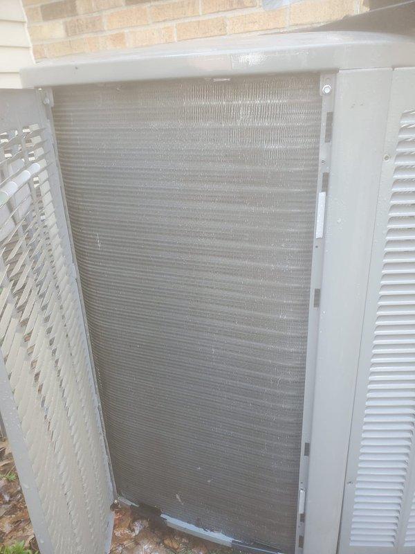 Completed AC Maintenance 1-3 on split system. Inspected outdoor condenser unit and found dust and debris accumulation on coil fins, which is normal for outdoor equipment. Inspected indoor evaporator coil in attic space and observed significant frost/ice buildup on coil surface and refrigerant lines, indicating potential airflow restriction, low refrigerant charge, or system operational issue requiring further evaluation.