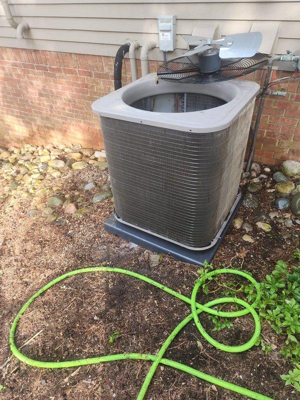 Completed comprehensive annual maintenance and tune-up on 8-year-old outdoor air conditioning unit located on west side of property. Performed full system inspection including visual examination of compressor, condenser coil, refrigerant lines, electrical connections, and wiring harness. Cleaned condenser coil fins and removed debris from unit interior and surrounding area. Verified proper operation of fan assembly and protective fan guard. Inspected copper refrigerant line assembly for signs of wear or damage. Checked all electrical connections and wiring for secure termination and proper routing. Evaluated compressor mounting and base plate condition. Confirmed unit is operating within normal parameters and ready for cooling season demand.