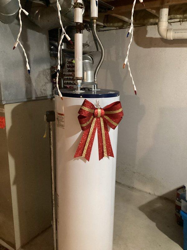 Completed comprehensive HVAC system assessment for equipment replacement in residential basement mechanical room. Evaluated existing heating system configuration, ductwork layout, and spatial requirements for new equipment installation, documenting current system components including furnace unit, metal ductwork, and associated piping infrastructure to provide accurate replacement estimate.