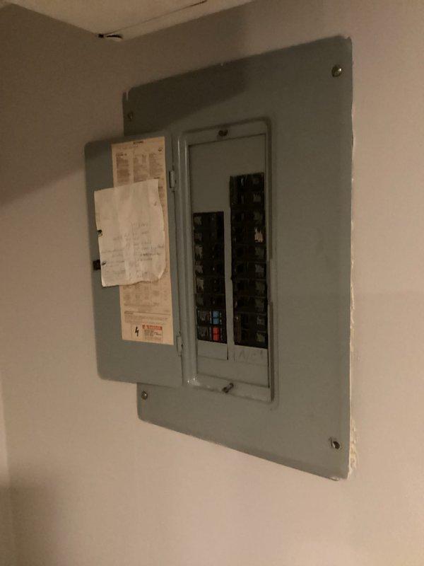 Conducted comprehensive assessment of 37-year-old original HVAC system from 1989 that has consistently underperformed since current occupancy began three years ago. Evaluated existing furnace unit in basement, outdoor condenser unit, and thermostat in living room to provide replacement estimate quotes. Documented equipment condition through photographs showing aged furnace with accumulated dust and dirt on filter grille, metal ductwork connections, PVC condensate drainage, and electrical breaker panel configuration to support recommendation for complete system replacement due to inadequate cooling performance requiring supplemental window units during warm weather.