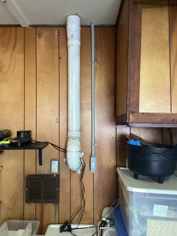 Installed a new 120-volt GFCI-protected RV receptacle on the exterior garage wall with wiring routed through an existing corner closet. Circuit was run above the basement ceiling and protected with conduit along the wall between the house and garage. Additionally, replaced two 2x2 fluorescent fixtures in the basement with new LED fixtures to improve lighting efficiency.