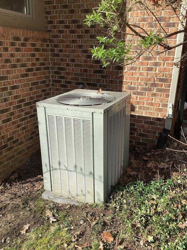 Conducted comprehensive HVAC system evaluation for equipment replacement estimate at residential property. Assessed existing outdoor air conditioning condenser unit mounted on concrete pad against exterior brick wall and indoor furnace system with PVC venting installed in basement utility area. Documented current equipment conditions, configurations, and installation requirements through detailed photographic documentation to provide accurate replacement system specifications and installation planning.