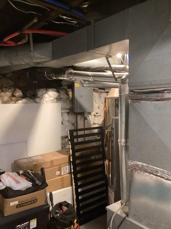 Provided estimate for complete HVAC system replacement including air conditioning unit and furnace located in basement area on northeast side of property. Existing 25-year-old equipment is non-operational and requires full replacement. Assessment included evaluation of current ductwork, refrigerant lines, condensate drainage system, and electrical connections to determine scope of installation work needed for new system.