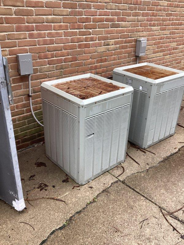 Completed on-site estimate for replacement of two residential air conditioning systems. Evaluated existing outdoor condenser units and indoor air handling equipment in mechanical room, documented current system configuration including electrical disconnects and refrigerant line routing, and assessed installation requirements for new equipment replacement.