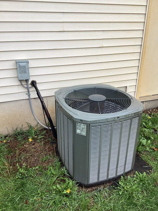 Conducted on-site assessment for HVAC system replacement quote CQ 03974-01, evaluating both full system and single system replacement options. Documented existing equipment including outdoor condenser unit with horizontal louver design and basement furnace installation, photographing current system configuration, electrical connections, ductwork routing, and equipment placement to provide accurate replacement specifications and multiple pricing options for customer consideration.