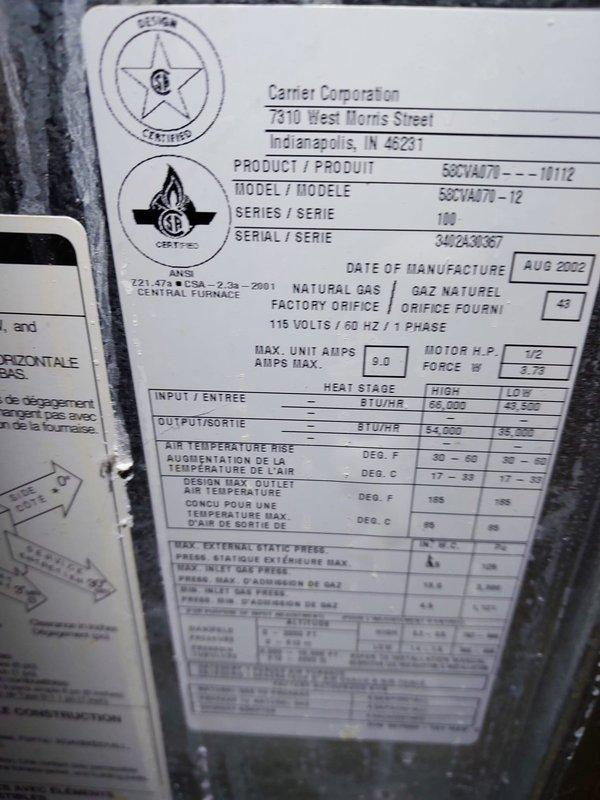 Responded to service call for furnace squealing on startup. Upon arrival, inspected Carrier 50CVA070 furnace unit manufactured August 2002. Diagnosed squealing noise as worn inducer motor bearings causing friction during startup cycle. Documented equipment specifications and current operating conditions through photographic record of unit data plates. Evaporator coil model CK6BXA030014AAAA confirmed compatible with R-410A refrigerant system. Recommended inducer motor assembly replacement to eliminate noise and prevent potential startup failure. Unit currently operational but requires prompt attention to avoid complete motor failure and loss of heating capability.