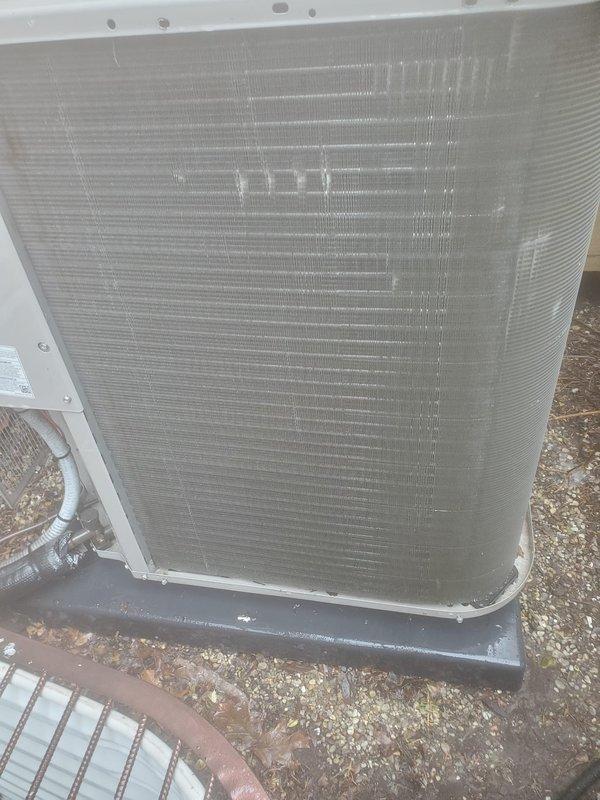 Completed preventive maintenance on residential air conditioning system under Worry Free Service Agreement. Inspected outdoor condenser unit with visible debris accumulation on coil fins and indoor evaporator coil with active condensation in drain pan. Performed standard cooling season maintenance procedures including visual inspection of refrigerant lines, verification of proper drainage operation, and assessment of overall system condition.