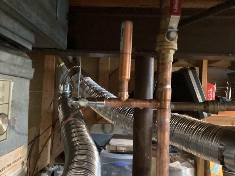 Successfully installed a 40-gallon tanked water heater in the basement utility area. The installation included proper integration with existing copper supply lines, connection to the HVAC system infrastructure, and verification of all plumbing connections for leak-free operation. The unit was positioned for optimal access and maintenance, with all safety requirements and building codes met upon completion.