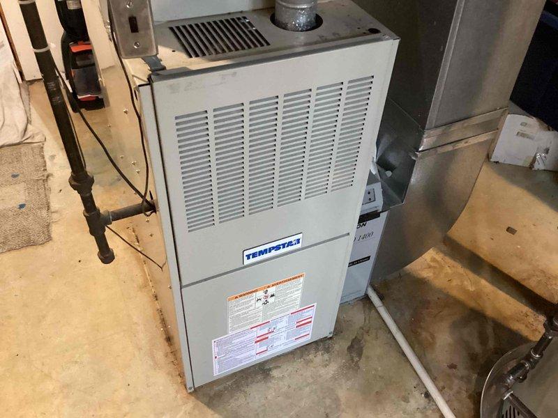 Successfully installed a 40-gallon tanked water heater in the basement utility area. The installation included proper integration with existing copper supply lines, connection to the HVAC system infrastructure, and verification of all plumbing connections for leak-free operation. The unit was positioned for optimal access and maintenance, with all safety requirements and building codes met upon completion.