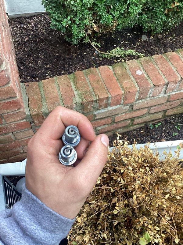 Performed scheduled maintenance on Generac standby generator unit. Inspected and cleaned fuel delivery system components, including removal and examination of fuel nozzles which showed normal wear patterns. Verified generator housing integrity, checked all external connections, and confirmed proper placement on concrete pad. Conducted visual inspection of surrounding area and adjacent HVAC equipment to ensure adequate clearance and ventilation for safe generator operation.