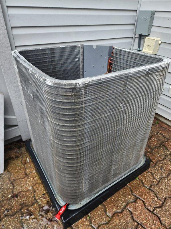 Performed comprehensive air conditioning tune-up on residential condensing unit located in front courtyard. Conducted complete system inspection including evaluation of compressor, condenser coils, refrigerant lines, and electrical connections. Verified proper operation of all components, checked refrigerant levels, inspected copper line sets and electrical wiring for integrity, and ensured condenser fins were clean and unobstructed for optimal airflow and system efficiency.