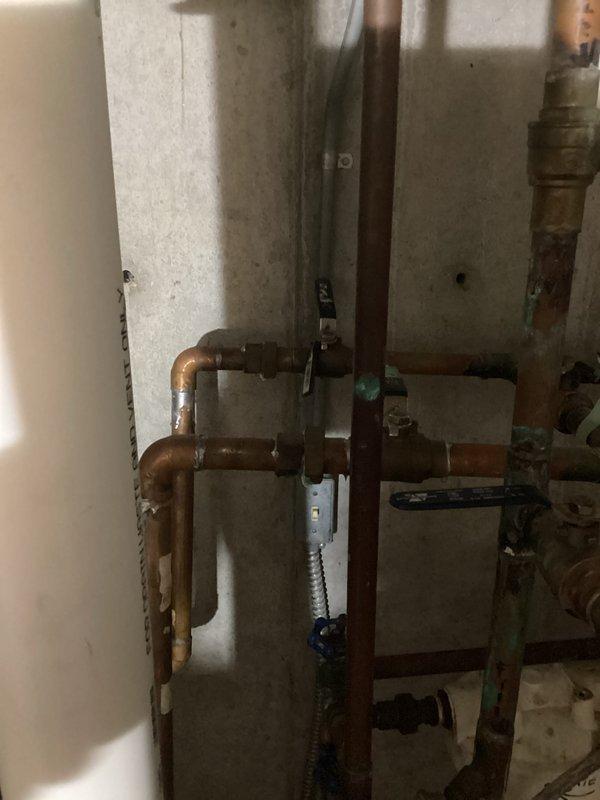 Completed equipment assessment and provided replacement estimate for residential HVAC system including air conditioning unit and natural gas furnace, both approximately 12 years old and currently operational. Evaluated existing outdoor condenser unit, indoor air handler components, copper refrigerant line set with ball valves, PVC condensate drainage system, and associated mechanical equipment to determine specifications and requirements for complete system replacement.