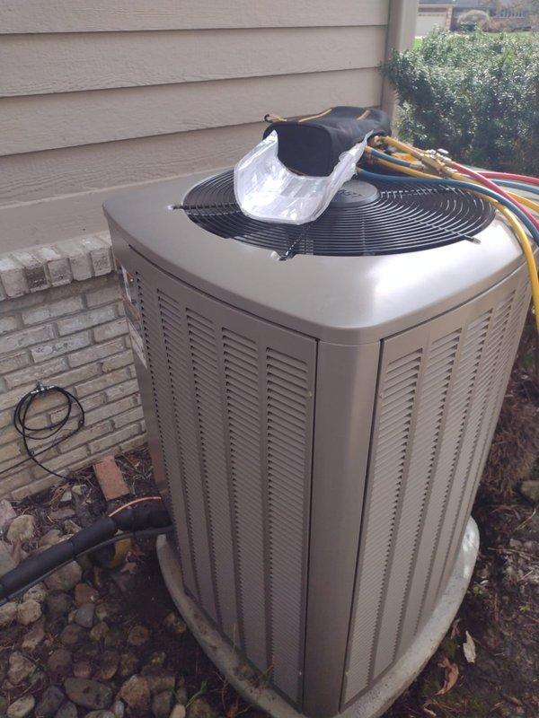 Successfully completed installation of a new Lennox complete HVAC system including high-efficiency furnace, air conditioning condenser unit, and S40 smart thermostat. The outdoor condenser unit was positioned on a concrete pad against the home's exterior with proper clearances, refrigerant lines were run and insulated, and all electrical connections were completed per manufacturer specifications. System was tested, verified operational, and left ready for use.