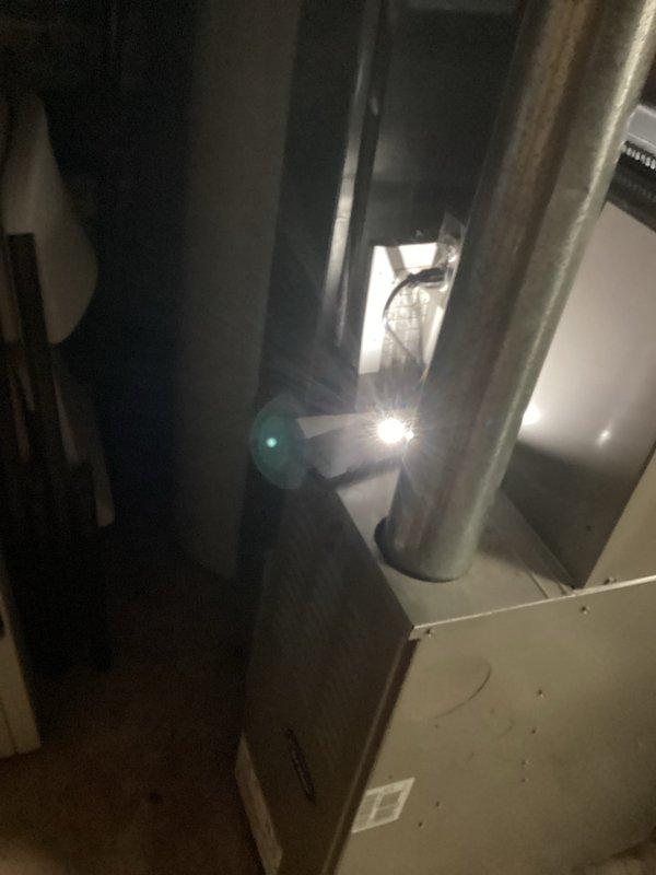 Provided estimate for complete air conditioning system replacement in basement mechanical room. Current 10-year-old AC unit is non-operational and requires full replacement. Assessed existing ductwork configuration, furnace connections, and available space for new equipment installation.