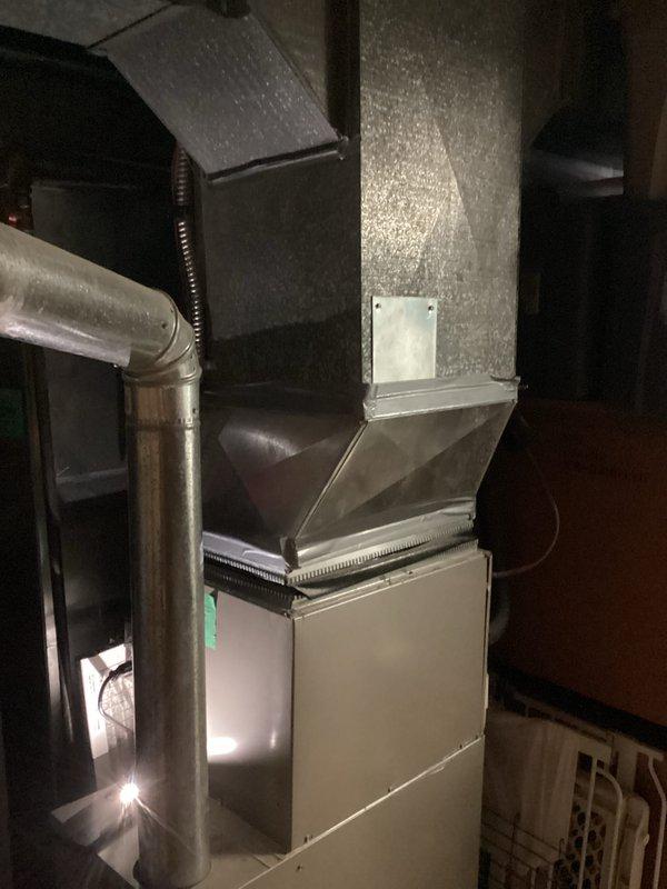Provided estimate for complete air conditioning system replacement in basement mechanical room. Current 10-year-old AC unit is non-operational and requires full replacement. Assessed existing ductwork configuration, furnace connections, and available space for new equipment installation.