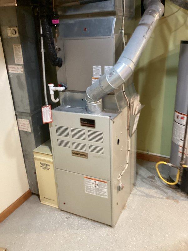 Conducted comprehensive estimate for complete HVAC system replacement in residential basement utility room. Evaluated existing furnace, air handler, and humidifier equipment for replacement specifications. Documented current system configuration including ductwork connections, gas line routing, PVC drainage system, and electrical connections to provide accurate replacement proposal.