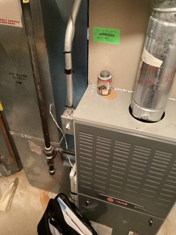 Provided comprehensive replacement estimate for non-functional 15-year-old residential air conditioning system. Assessed existing Trane furnace installation in basement utility area, documented current HVAC configuration including PVC venting system, ductwork connections, and humidifier components. Evaluated system for complete AC replacement options and discussed equipment specifications with homeowner to ensure proper sizing and compatibility with existing infrastructure.